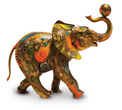 Colorful decorated elephant figurine with raised trunk.