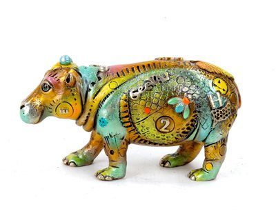 Colorful, decorative hippopotamus figurine with patterns.